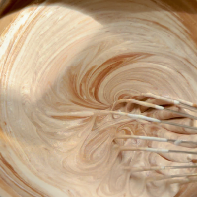 Whisk cream into chocolate