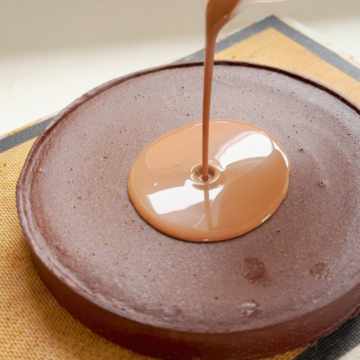 Add ganache to tart