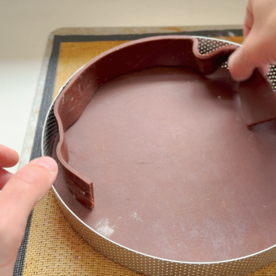 Line sides of perforated tart ring