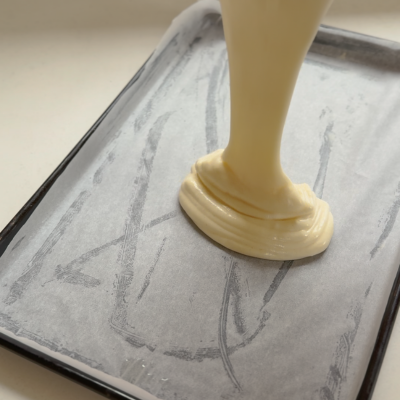 Pour batter into tin