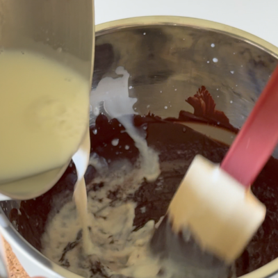slowly add over melted chocolate