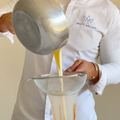 Pour mixture through a sieve